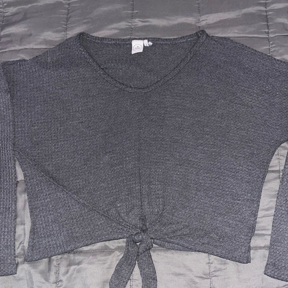 Gray slightly cropped tie front longsleeve shirt.